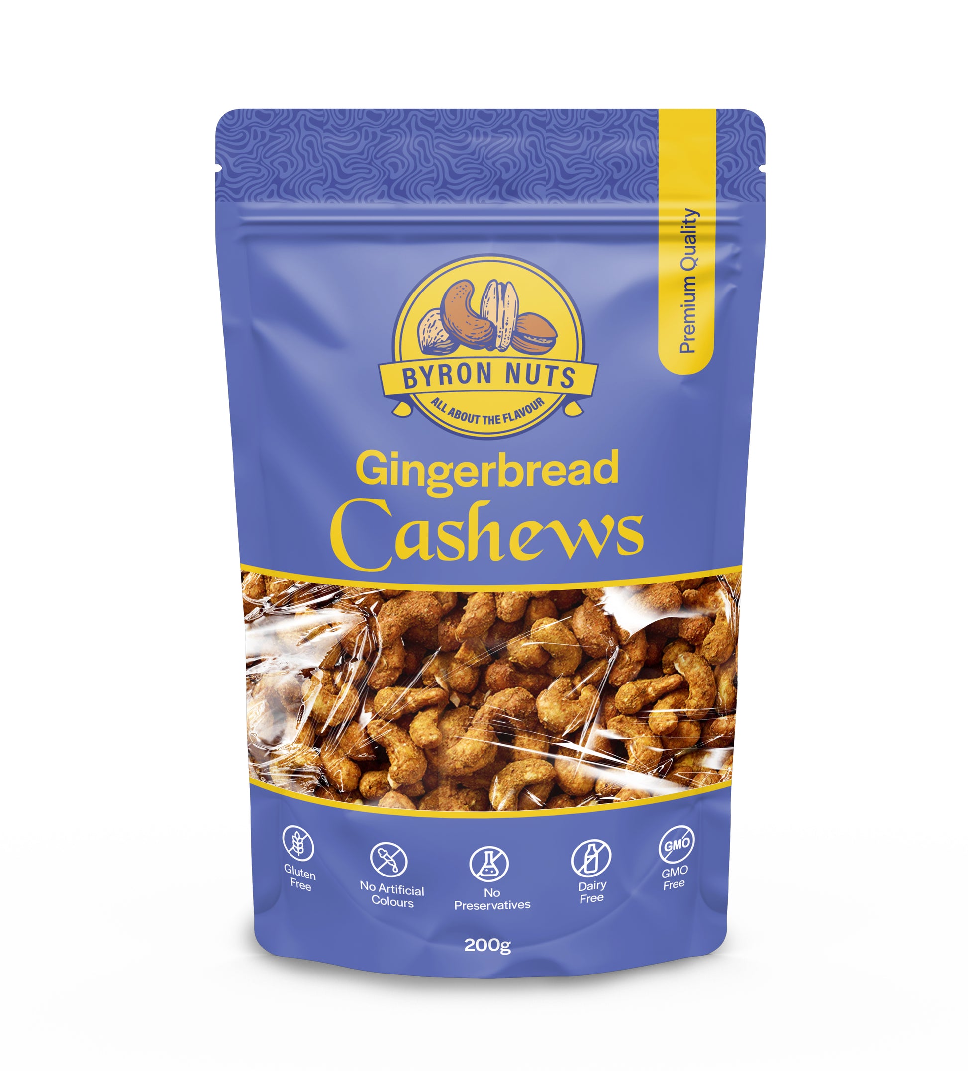 Gingerbread-flavored Byron Nuts cashews displayed in a clear bowl on a wooden surface, showcasing the spiced, crunchy snack.