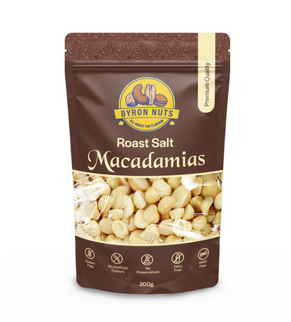 Salted roasted macadamia nuts from Byron Bay Nuts, close-up of golden, crunchy macadamias in a bowl.